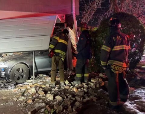 Car crashes into house, leaves behind mess of debris