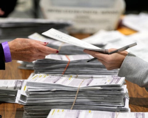 US Justice Department sues 3 states, District of Columbia for voter data