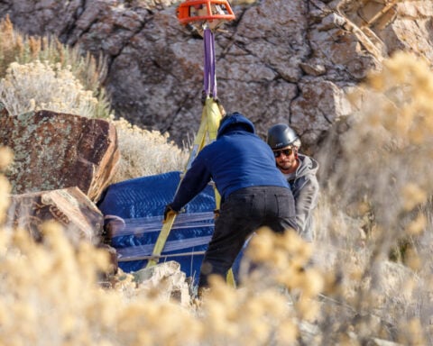 Church repatriates sacred rock covered with petroglyphs after 14-year effort