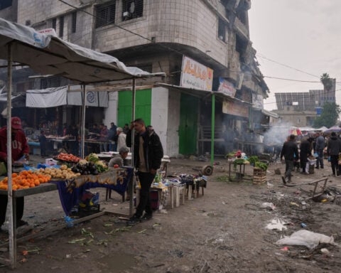 Spread of famine in Gaza Strip averted but Palestinians there still face starvation, experts say