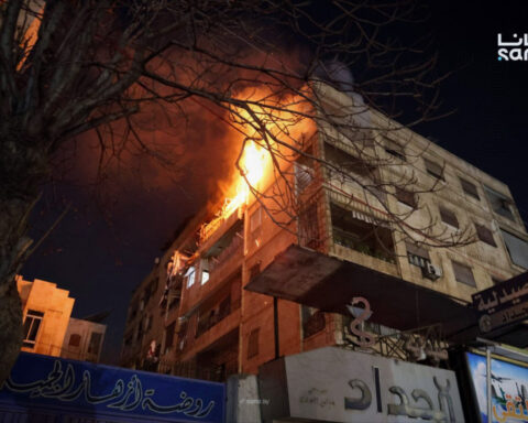 Clashes flare as top Turkish officials visit Syria ahead of a deadline for Kurdish integration