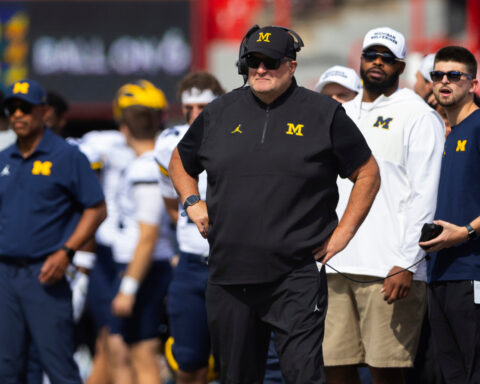 Michigan interim coach Biff Poggi wants to keep the job beyond bowl game and 'fix this program'