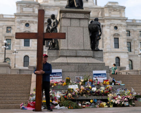When communities are grieving, he comes bearing a 10-foot cross. Here’s his story