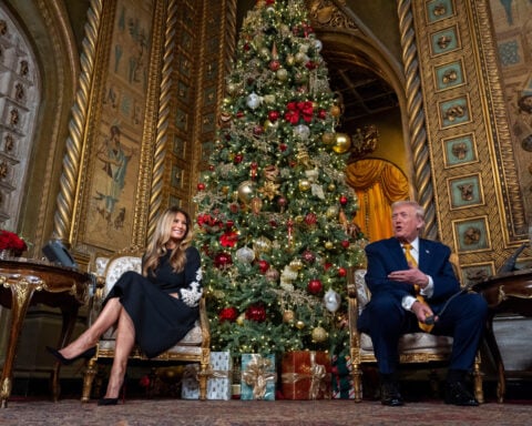 Trump warns against infiltration by a 'bad Santa,' defends coal in jovial Christmas calls with kids