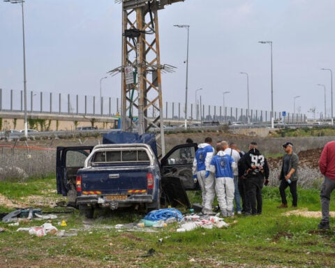 Two Israelis killed in Palestinian car-ramming and stabbing attack, police say