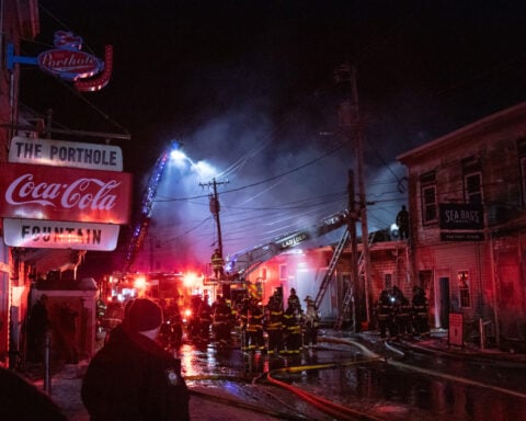 Fire in Old Port of Portland, Maine, damages its historic waterfront and sinks at least 1 boat