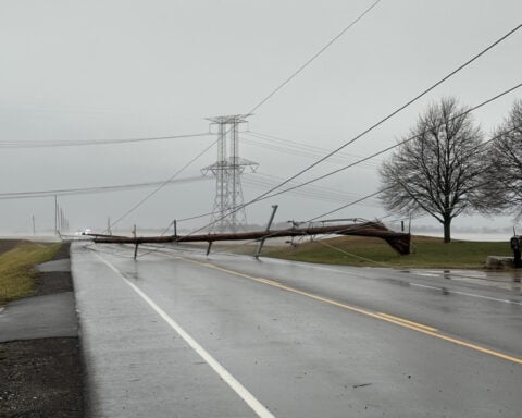 Powerful storm disrupts travel with blizzard conditions and tornadoes as winter returns to the US with a vengeance