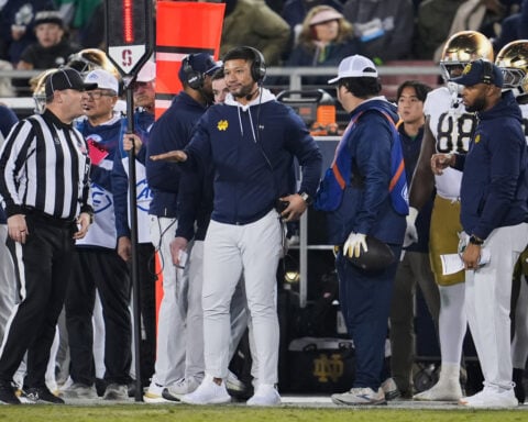 Marcus Freeman will return to Notre Dame after having his contract restructured, school confirms