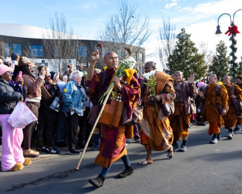 Buddhist monks persist in peace walk despite injuries as thousands follow them on social media