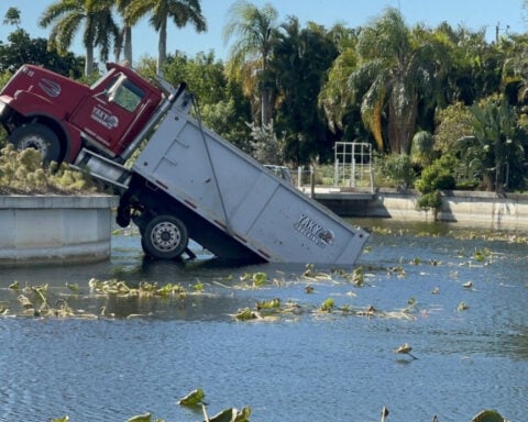 'You don't see this every day': Construction truck falls into Cape Coral canal