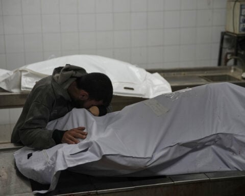 Grandmother and grandson burn to death in Gaza tent while cooking; Jolie visits Rafah crossing