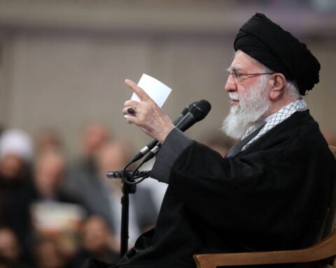 Iran's leader says rioters 'must be put in their place' as protest death toll reaches at least 15