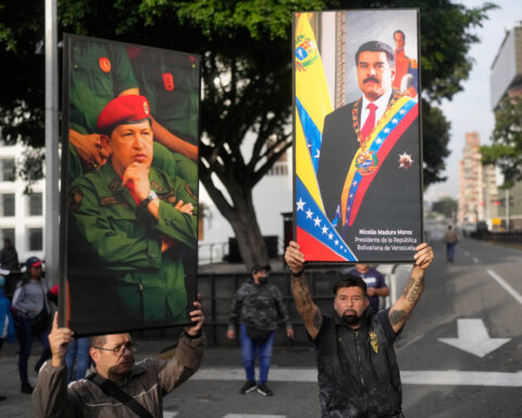 The Latest: Trump says US will run Venezuela at least temporarily after military option