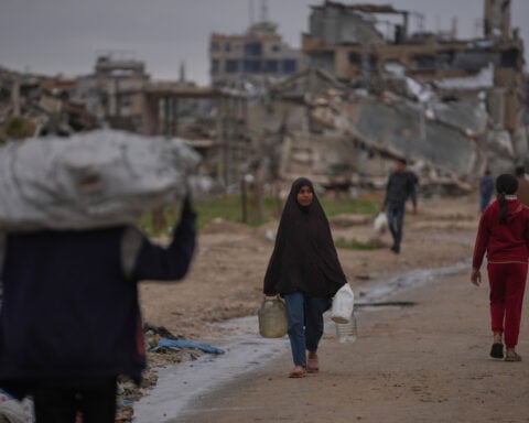 International aid groups grapple with what Israel's ban will mean for their work in Gaza