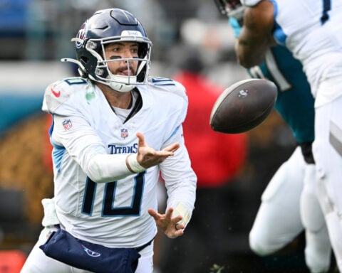 Streaking Jaguars clinch AFC South title with a 41-7 drubbing of Titans