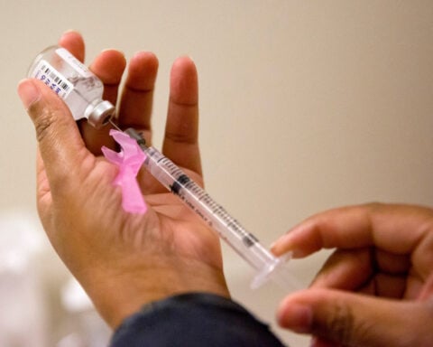 Flu season surged in the US over the holiday and already rivals last winter's harsh epidemic
