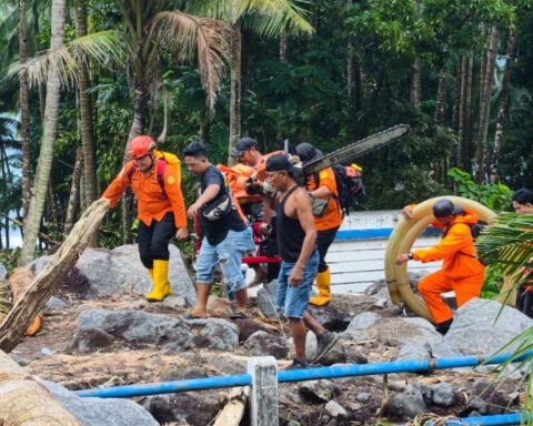 Flash floods in Indonesia kill at least 16 people and sweep away homes