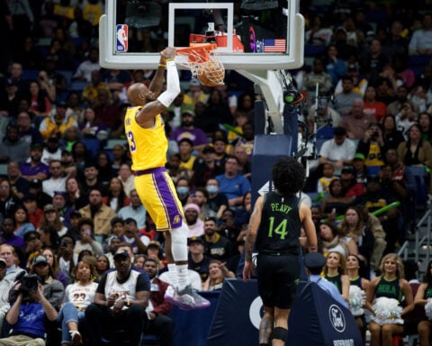 James and Doncic each score 30 to help the Lakers hold off the Pelicans 111-103