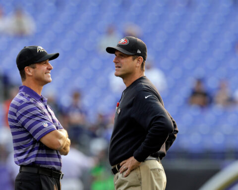 Jim Harbaugh predicts brother John will return to NFL coaching soon but he hopes it's in the NFC