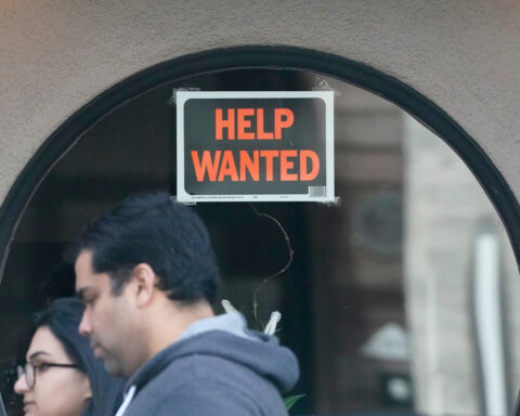 Slightly more Americans file for jobless benefits in the last week of 2025, but layoffs remain low