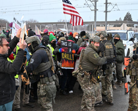 The Latest: ICE officer who shot Renee Good identified in court records as Jonathan Ross