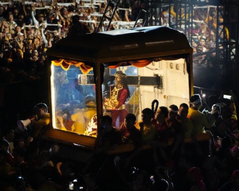 Filipino Catholics express outrage over corruption scandal during massive religious procession