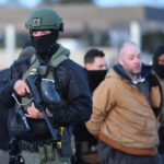 The Latest: Outrage spills onto streets of Portland and Minneapolis after ICE shootings