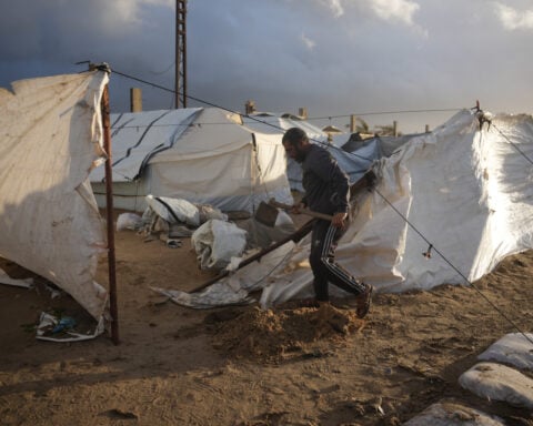 Israeli strikes kill at least 13 across Gaza, as Trump is expected to announce Board of Peace