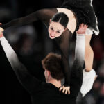 Efimova and Mitrofanov defend pairs title but face nervous citizenship wait for Olympic spot