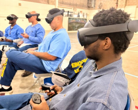 VR headsets are 'hope machines' inside California prisons, offering escape and practical experience