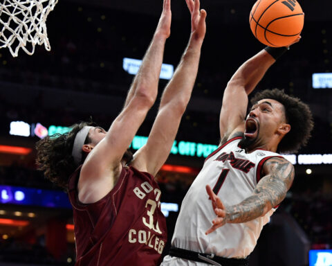 No. 20 Louisville beats Boston College 75-62 as ex-G League player London Johnson is made available