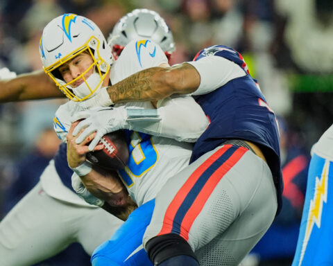 Chargers coach Jim Harbaugh says 'Those that stay will be champions.' QB Justin Herbert isn't sure