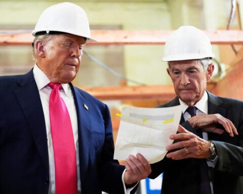 The Latest: Trump lashes out at Federal Reserve in speech to Detroit Economic Club