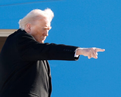 Trump visits Ford plant and defends his tariffs, hoping to counter jitters about the economy