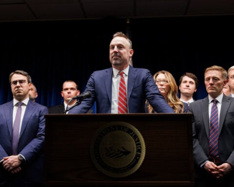 Justice Department sees no basis for civil rights probe in Minnesota ICE shooting, official says