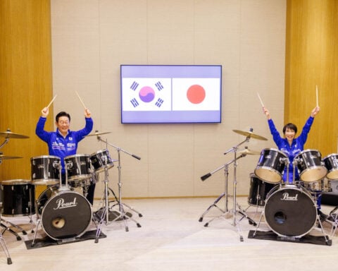Drumstick diplomacy for Japan and South Korea as leaders bang out K-pop hits
