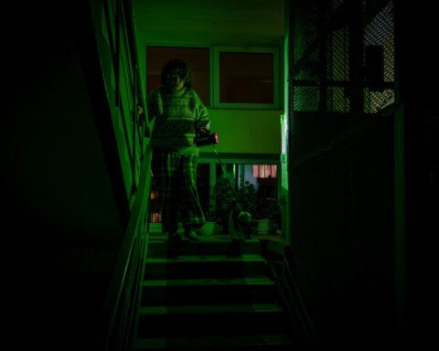 Ukrainians endure freezing temperatures at home as crews rush to restore power