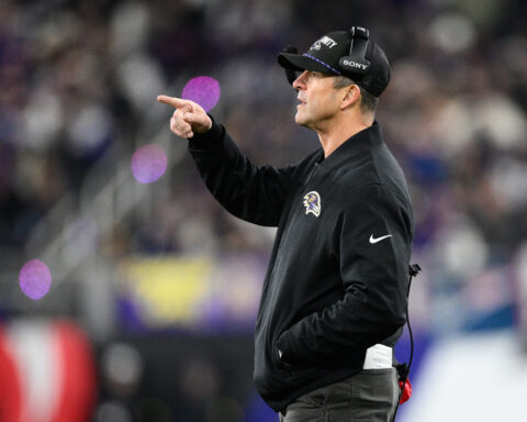 John Harbaugh and the Giants are working on a deal to make him their coach, AP sources say
