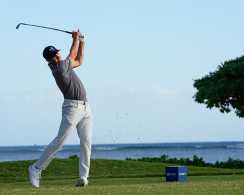 Defending champion Nick Taylor tied for Sony Open lead