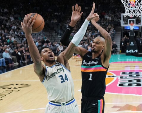 Wembanyama shaves head, shines brightly in leading Spurs past Antetokounmpo, Bucks