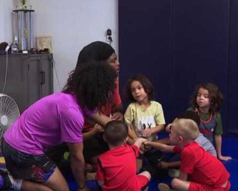 Former national champion wrestler inspires youth through Florida wrestling program