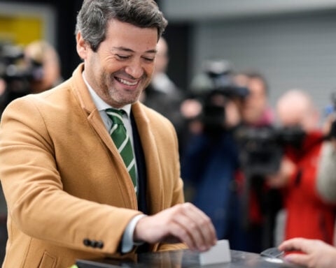 Hard-right populist wins a place in a two-way runoff in Portugal’s presidential election