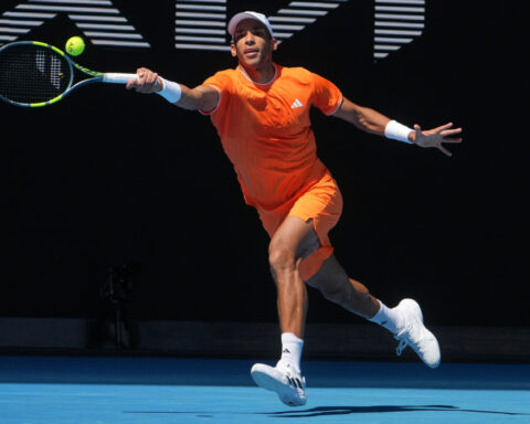 Canada's Stakusic leaves court in a wheelchair as Australian Open warms up