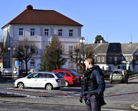 Czech town hall shooting leaves 1 dead and 6 wounded
