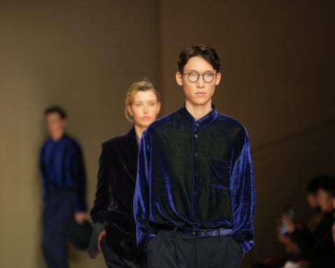 Giorgio Armani launches new era with iridescent colors and a star-studded front row