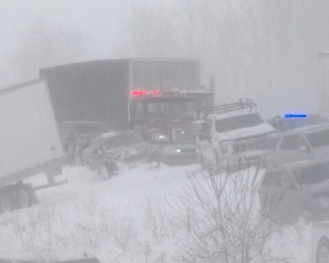 100 vehicles pile up in Michigan crash as snowstorm moves across the country