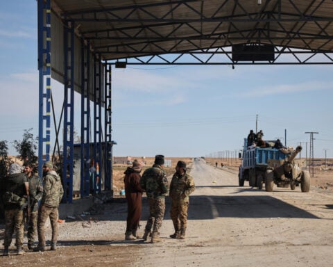 Syrian military, Kurdish-led forces announce new truce after guards leave camp housing IS families