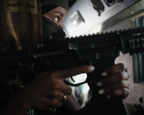 Veteran AP videographer describes grisly images and 'burning smoke' of a Haitian gang attack