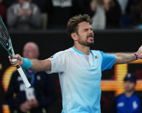 Djokovic one away from 400 Grand Slam match wins; Wawrinka makes history