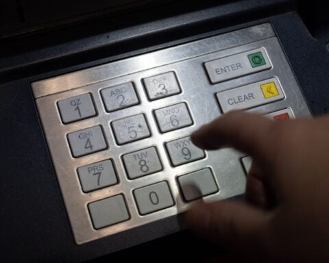 Prices ticked up in November as Americans keep spending, a key inflation measure shows